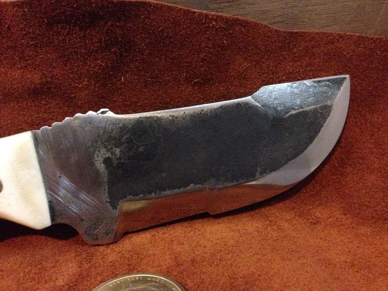 hand-forged carbon steel bushcraft knife by Metals Artisan Laevi Susman
