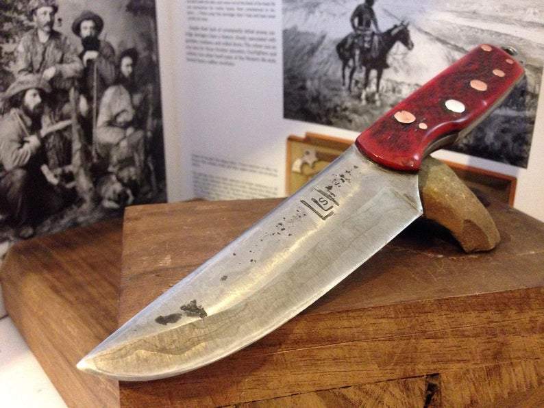 hand-forged red bone carry knife by Metals Artisan