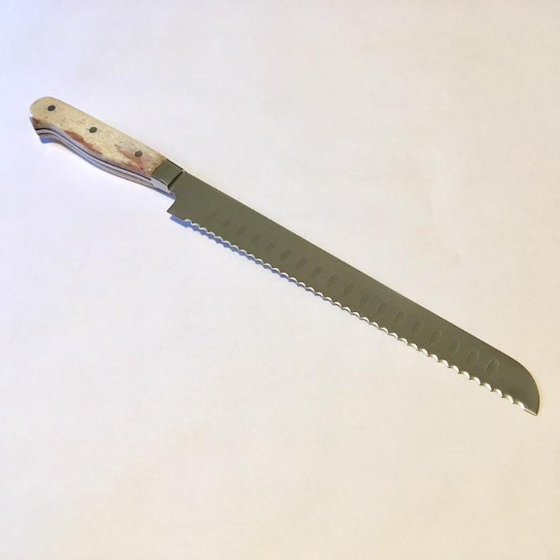 VG-10 serrated steel challah knife with custom handle